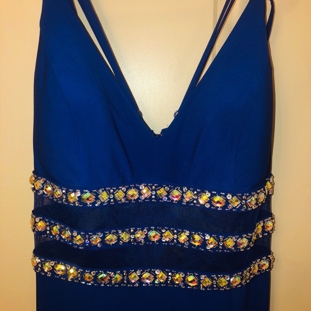 Navy blue with jewels embroidered around the bust